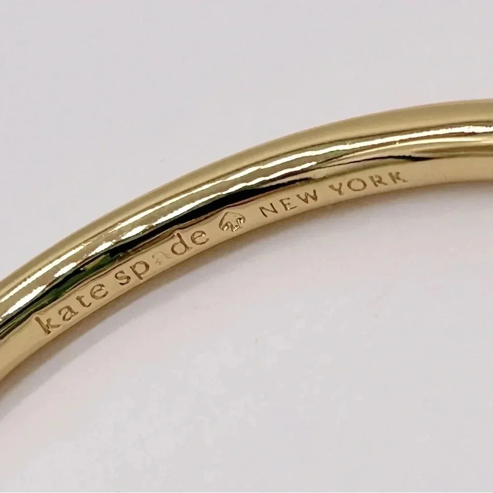 Kate Spade Sailor’s Knot Gold Hinged Bangle